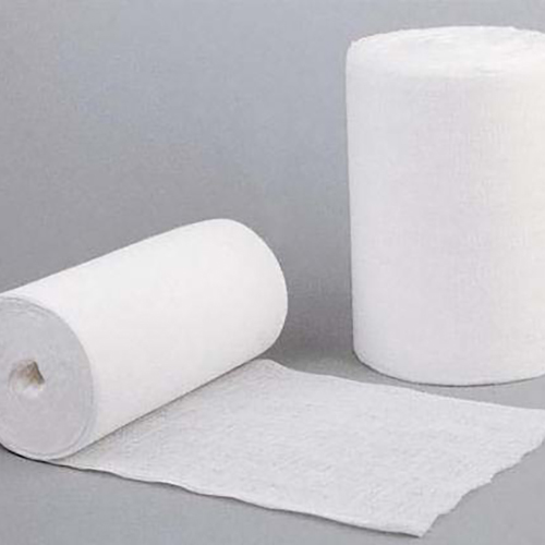 Máquina plegadora y enrolladora de gasa absorbente